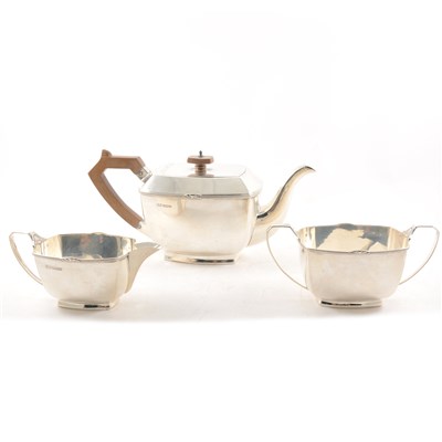 Lot 323 - Silver three piece teaset