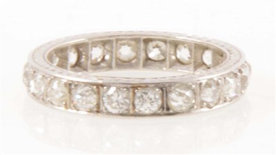 Lot 196 - A diamond full eternity ring.