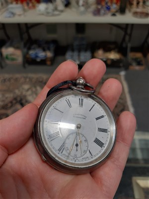 Lot 237 - A 1935 King George V and Queen Mary Silver Jubilee silver cased pocket watch and medal, by JW Benson