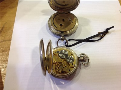 Lot 237 - A 1935 King George V and Queen Mary Silver Jubilee silver cased pocket watch and medal, by JW Benson