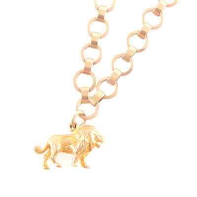 Lot 226 - A 9 carat yellow gold circular link bracelet with lion charm