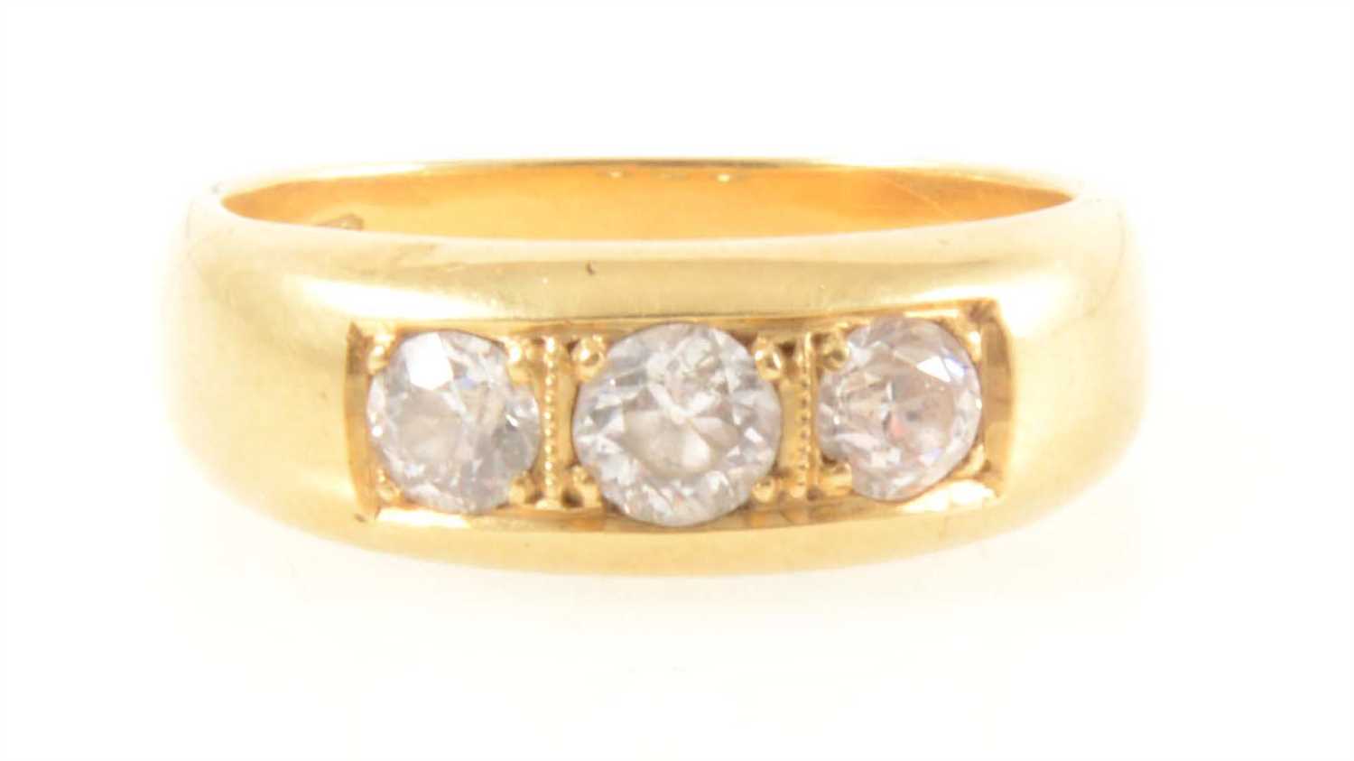 Lot 192 - A gentleman's diamond three stone ring.