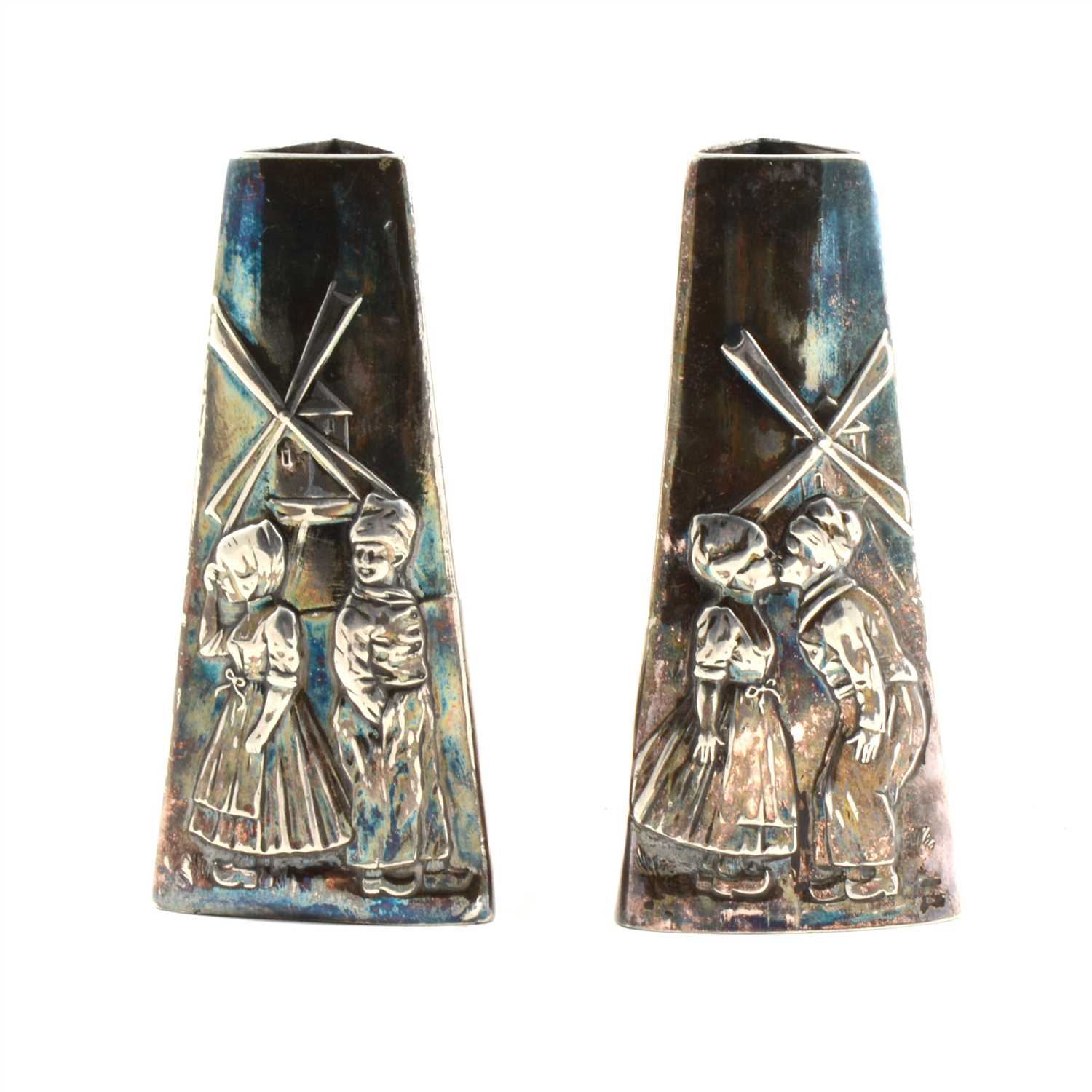 Lot 141 - A pair of WMF spill vases with Dutch scenes