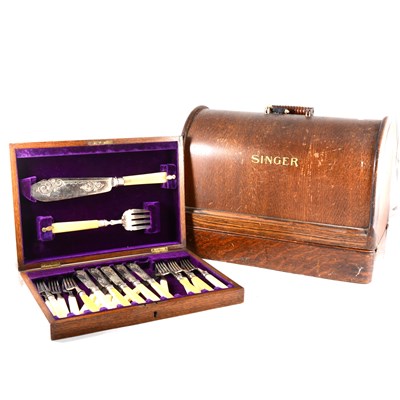 Lot 194 - A cased set of fish knives and forks, Singer sewing machine, and a desk-top filing cabinet