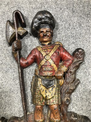 Lot 127 - Cast iron doorstop, in the form of a Scottish Highlander