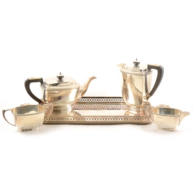 Lot 206 - A silver four piece tea set by William Suckling Ltd, on a silver-plated tray