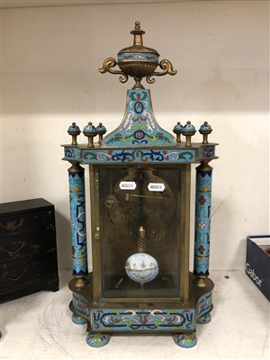 Lot 153 - A brass and enamel shelf clock with pagoda top and free standing pillars, a pair of turquoise geese.