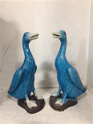 Lot 153 - A brass and enamel shelf clock with pagoda top and free standing pillars, a pair of turquoise geese.