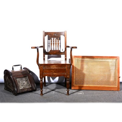 Lot 682 - A Victorian carved walnut slope front coal box, commode, stool commode, and a back rest