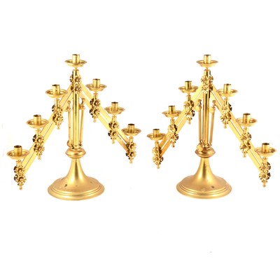 Lot 172 - A pair of lacquered brass Gothic Revival adjustable candelabra