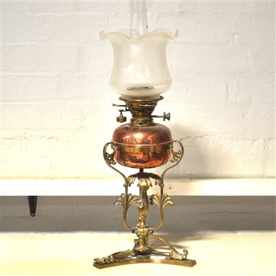 Lot 421 - A brass oil lamp