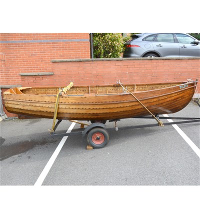 Lot 496 - 12ft Clinker dinghy, "Tejay", with British Seagull outboard motor, on trailer