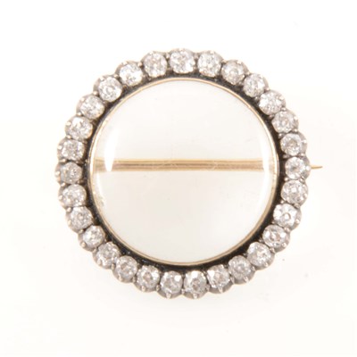 Lot 170 - A diamond and crystal brooch.