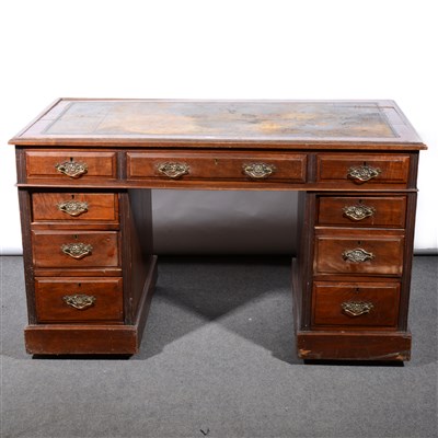 Lot 411 - An Edwardian walnut twin pedestal desk