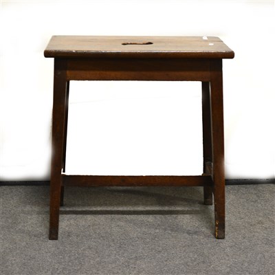 Lot 351 - A mahogany stool, rectangular top with a hand-hold