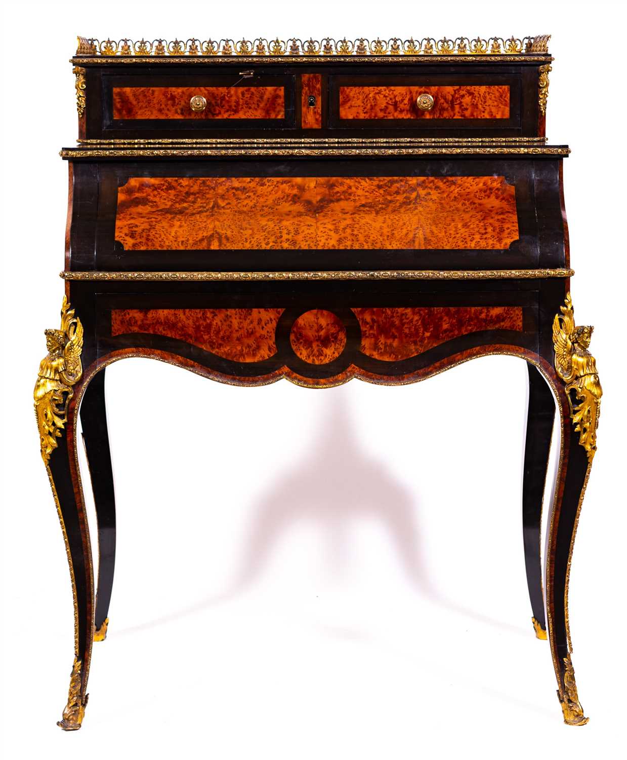 Lot 471 - A Louis Philippe style amboyna and ebonised Bonheur-du-jour, late 19th Century