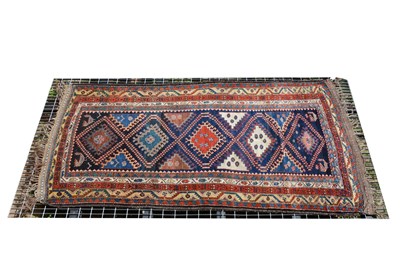 Lot 517 - A Persian runner, five lozenge shape tiles