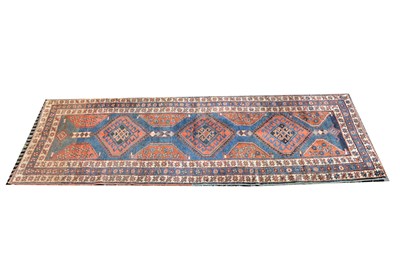 Lot 512 - A Persian runner, three tile-shaped lozenges