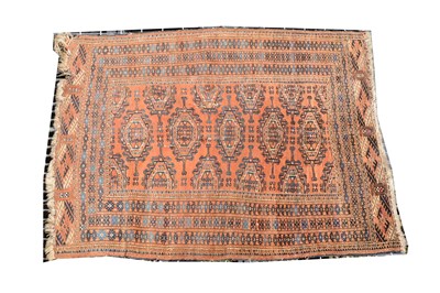 Lot 493 - A Turkoman rug, red ground