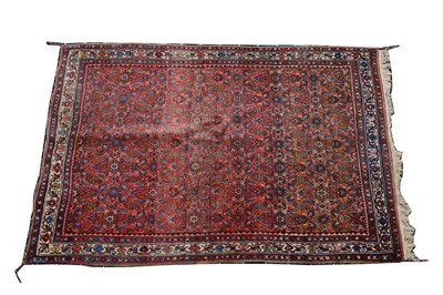 Lot 523 - A small Qashqai pattern rug