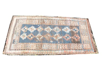 Lot 491 - A Belouch rug, dark blue field