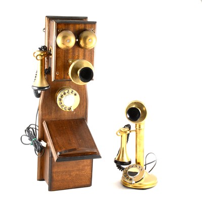 Lot 167 - Lacquered brass candlestick telephone, together with a wall mounted telephone.