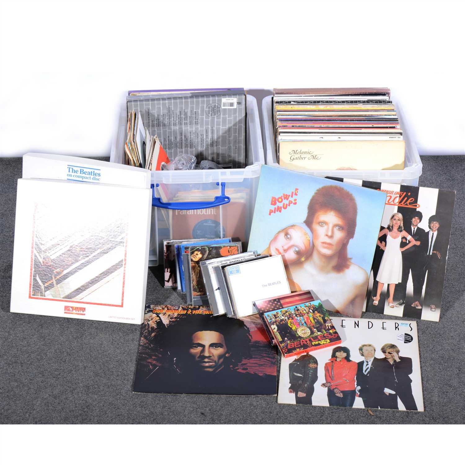 Lot 681 - Two boxes of vinyl records and CDs, including David Bowie, Queen, etc.