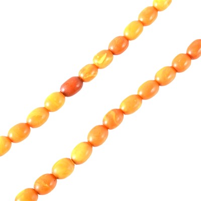 Lot 344 - A string of amber coloured beads.