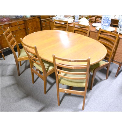 Lot 326 - A G-plan dining suite, comprising an oval extending table, ...