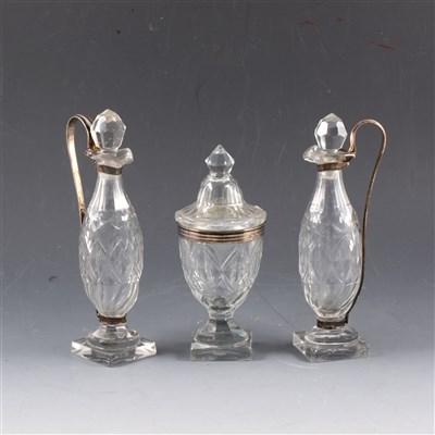 Lot 203 - Pair of Georgian silver-mounted cut glass vinegar bottles and similar jar and cover