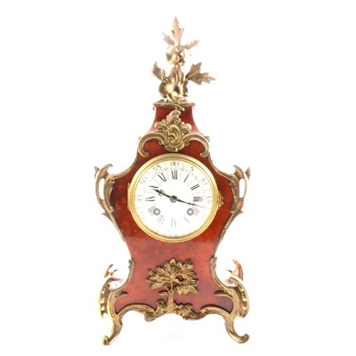 Lot 134 - A late 19th Century French tortoiseshell veneered mantel clock