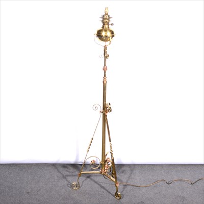 Lot 564 - An English Art Nouveau lacquered brass and copper adjustable standard lamp, manner of Benson