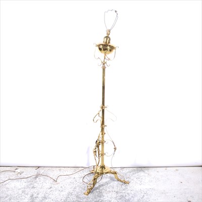 Lot 489 - An English Art Nouveau brass standard lamp, converted.