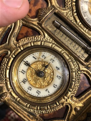 Lot 106 - An early 20th Century French gilt metal table clock barometer and thermometer
