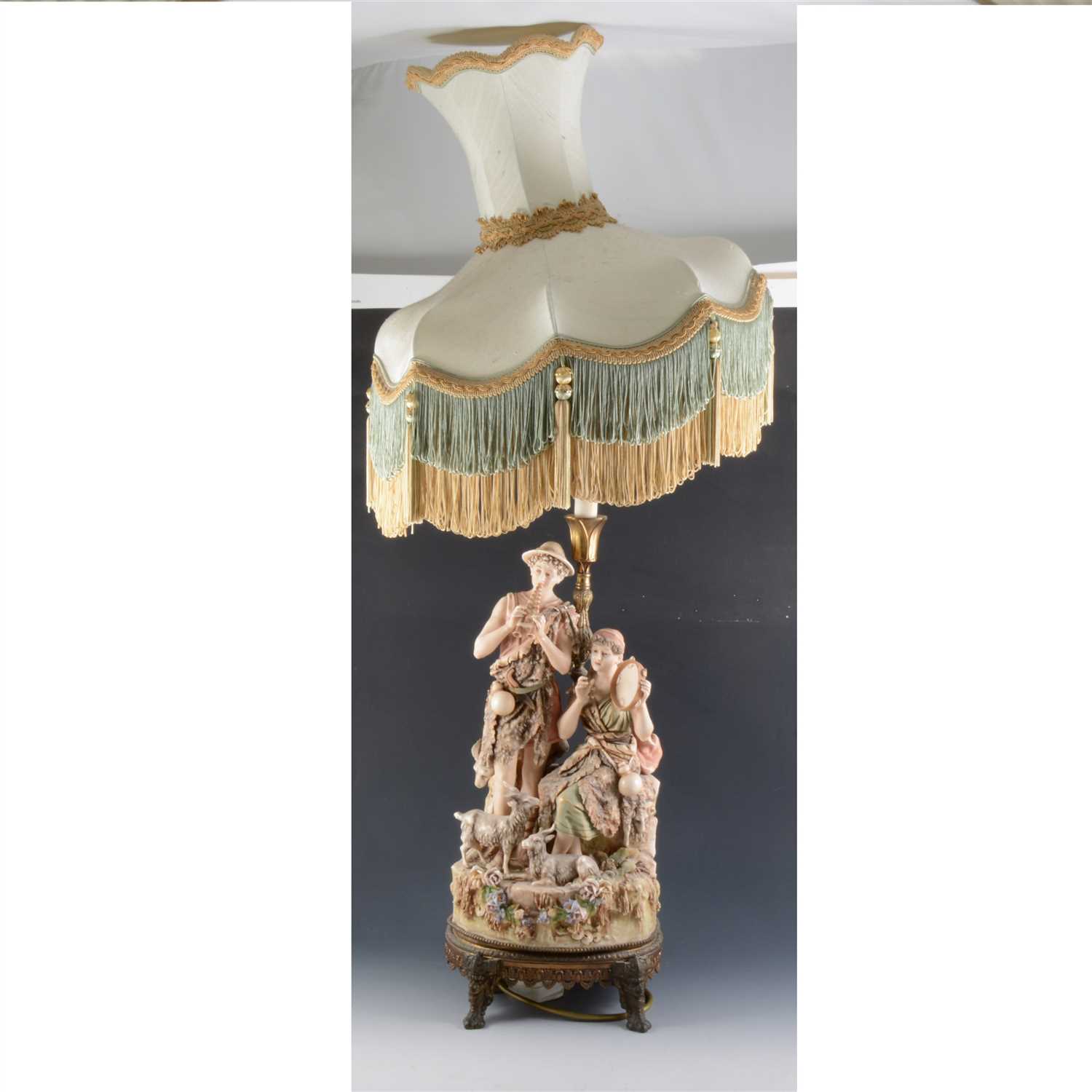 Lot 59 - Royal Dux table lamp, modelled with shepherd and shepherdess musicians