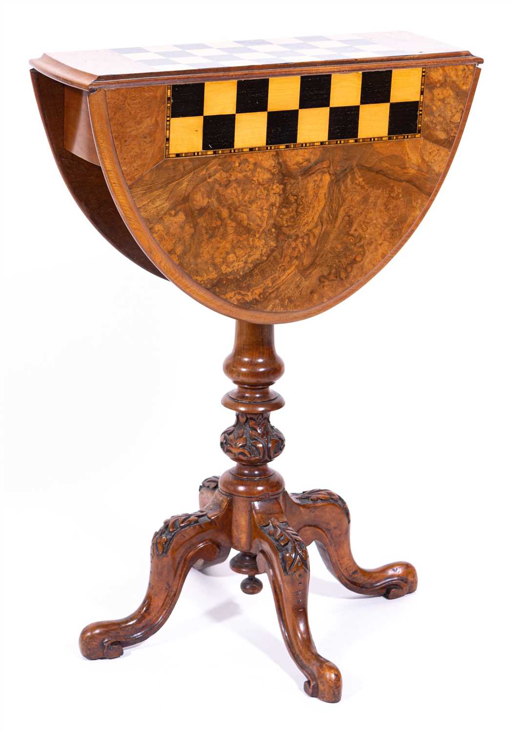 Lot 489 - A Victorian figured walnut drop-leaf games table