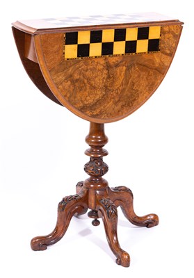 Lot 489 - A Victorian figured walnut drop-leaf games table