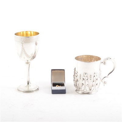 Lot 204 - A silver Christening mug, a Victorian silver goblet and a small yellow metal tie-pin
