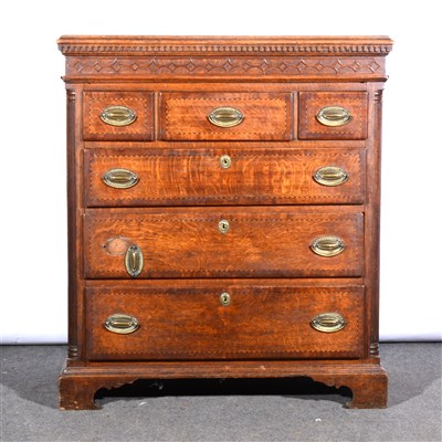 Lot 490 - A George III oak chest of drawers, adapted