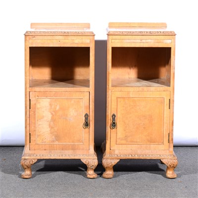 Lot 498 - A pair of bleached walnut bedside cupboards