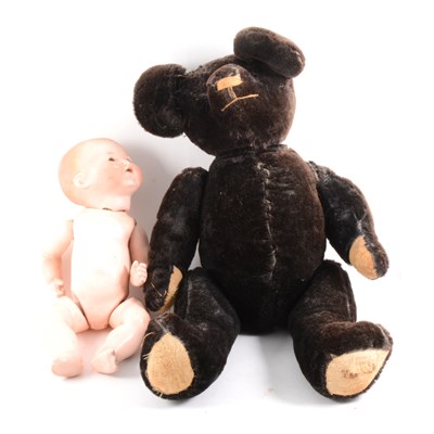 Lot 101 - Old black teddy bear and  a bisque head doll by Armand Marsielle