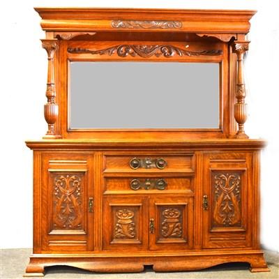 Lot 466 - An Edwardian carved oak sideboard