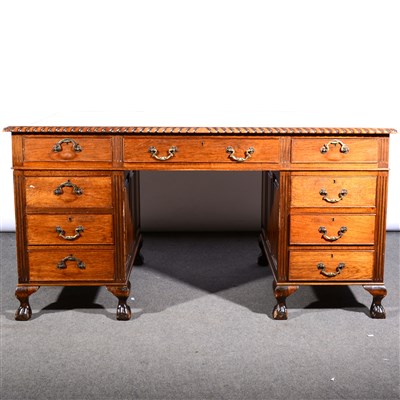 Lot 454 - A stained wood twin pedestal desk