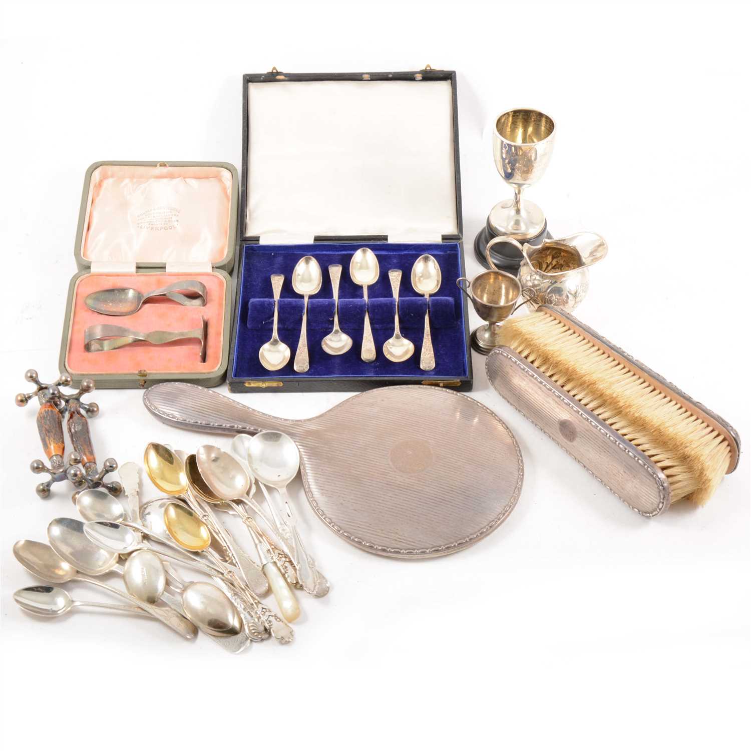 Lot 180 - A collection of silver flatware and other items