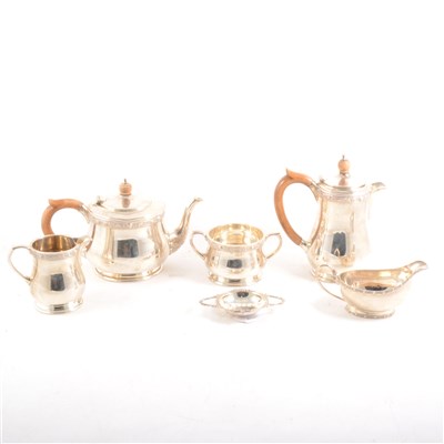 Lot 212 - A silver four piece tea set by H Pidduck & Sons with a similar Scottish cream jug and a tea strainer