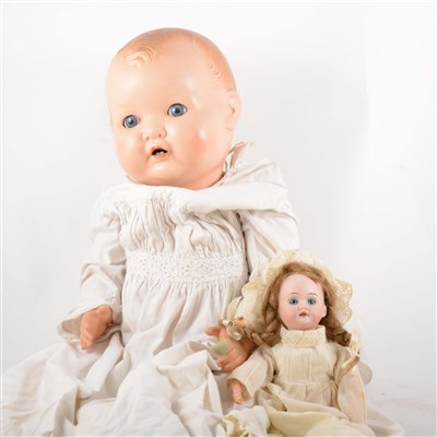 Lot 100 - A German bisque head doll, fixed eyes,  open mouth, composition jointed body; and another composition doll.