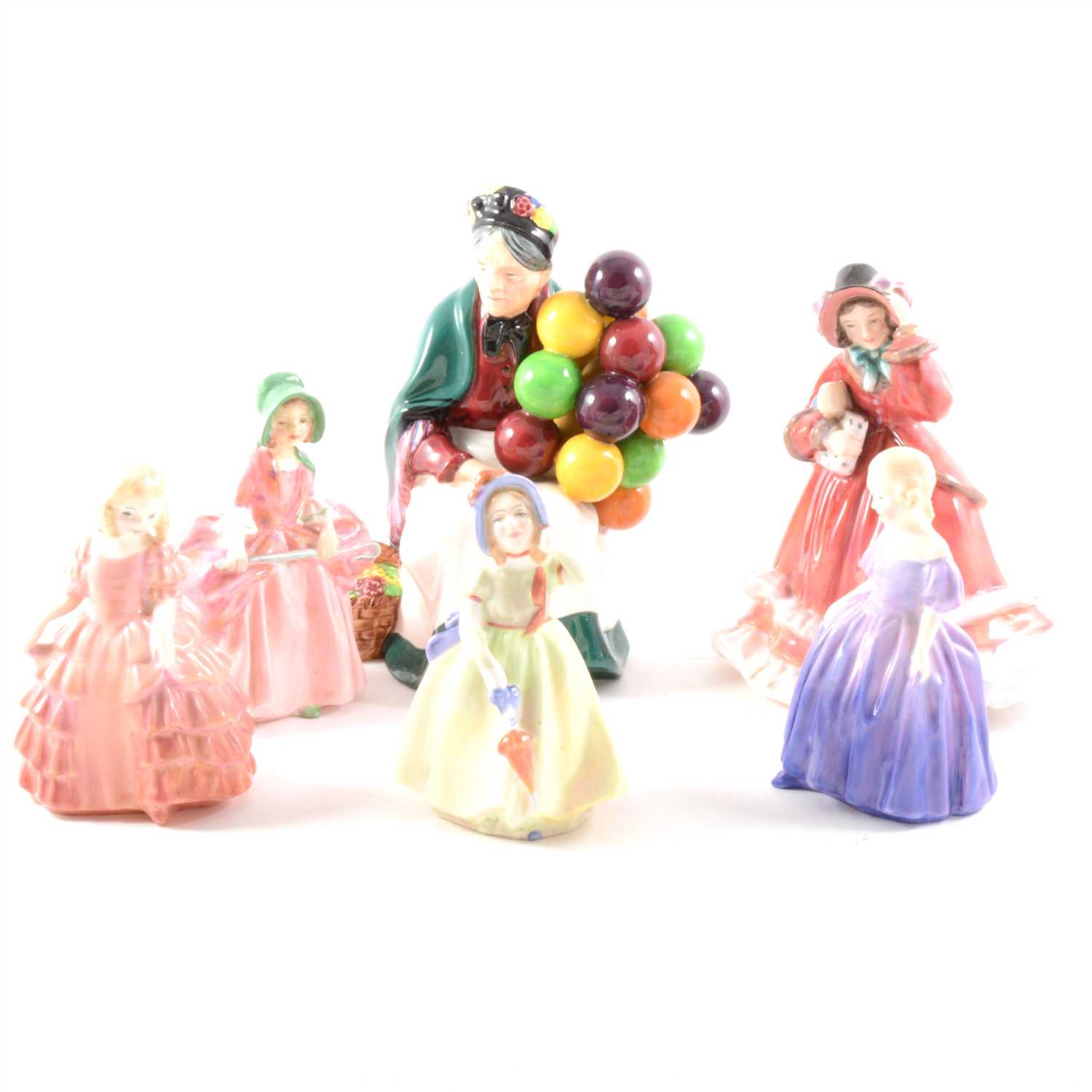 Lot 11 - A Royal Doulton figure, The Old Balloon Seller, HN1315, and five other Doulton fgures