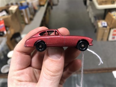 Lot 265 - Matchbox Toys; no.53 Aston Martin DB2, metallic red body, black plastic wheels, boxed