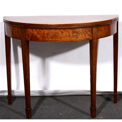 Lot 372 - A George III mahogany demi lune tea table