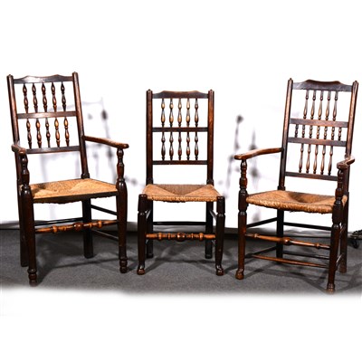Lot 645 - A matched set of seven Lancashire type spindle-back dining chairs